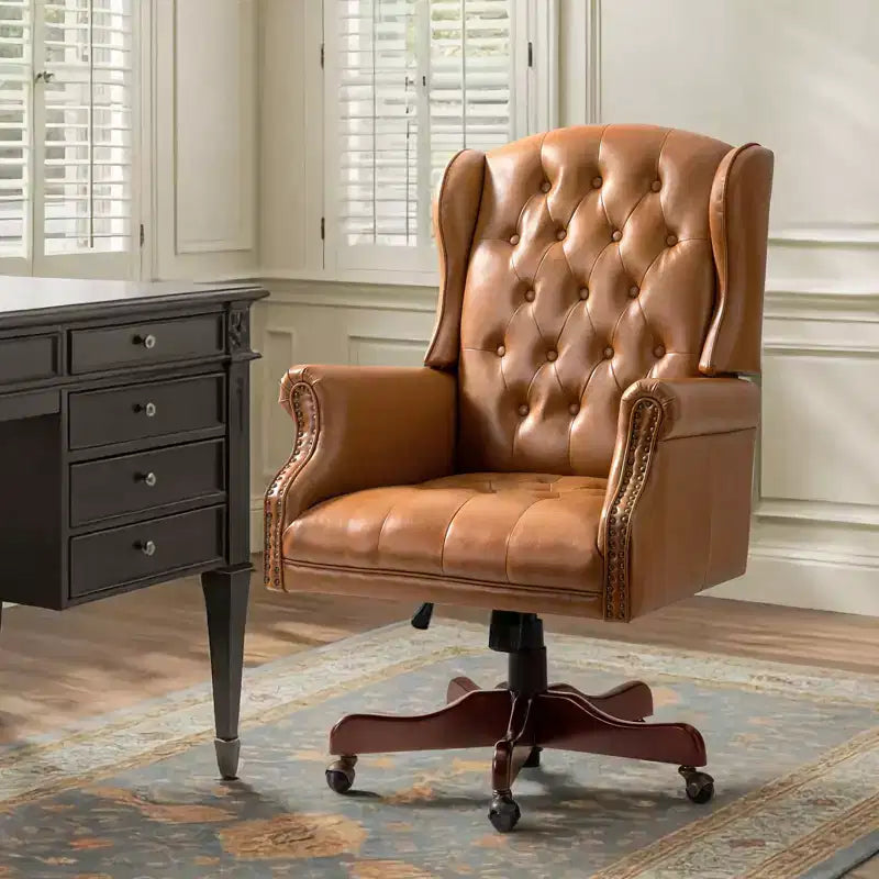 Fauteuil de bureau de direction traditionnel en similicuir avec piétement en bois massif et dossier capitonné